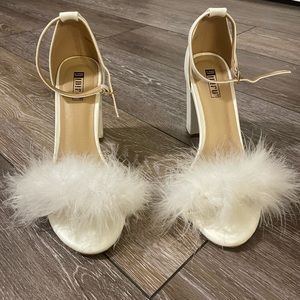 White block feather heels